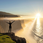 A solitary figure stands on a sun-drenched cliff overlooking a vast, calm ocean at sunrise. The person is extending their hands forward, palms open, as if gently releasing a luminous, ethereal mist or a collection of symbolic, weightless chains that float away into the horizon. Their posture conveys profound relief and liberation, facing away from the viewer towards the expansive, peaceful landscape. The scene emphasizes emotional freedom and letting go of past burdens.